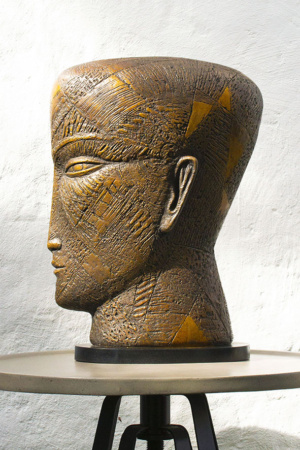 HEAD WITH TRIANGLES